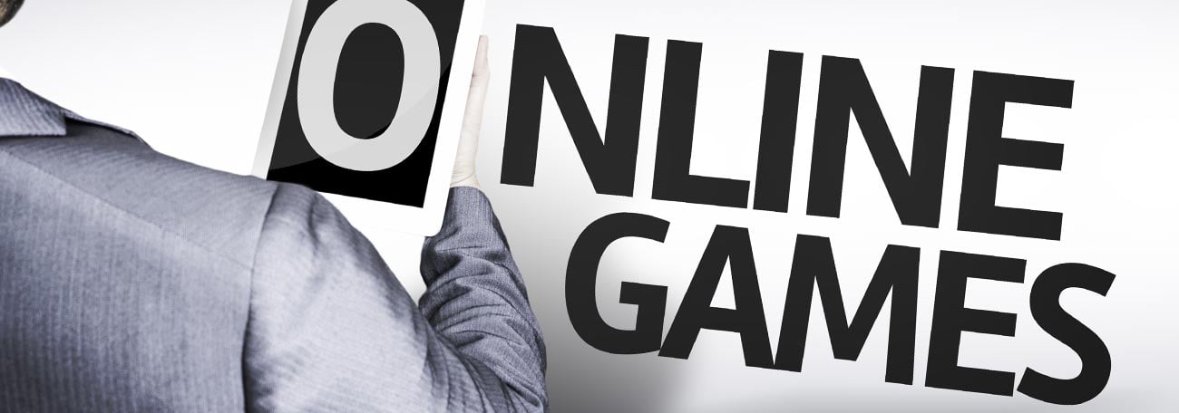 man with cropped beard playing online casino games