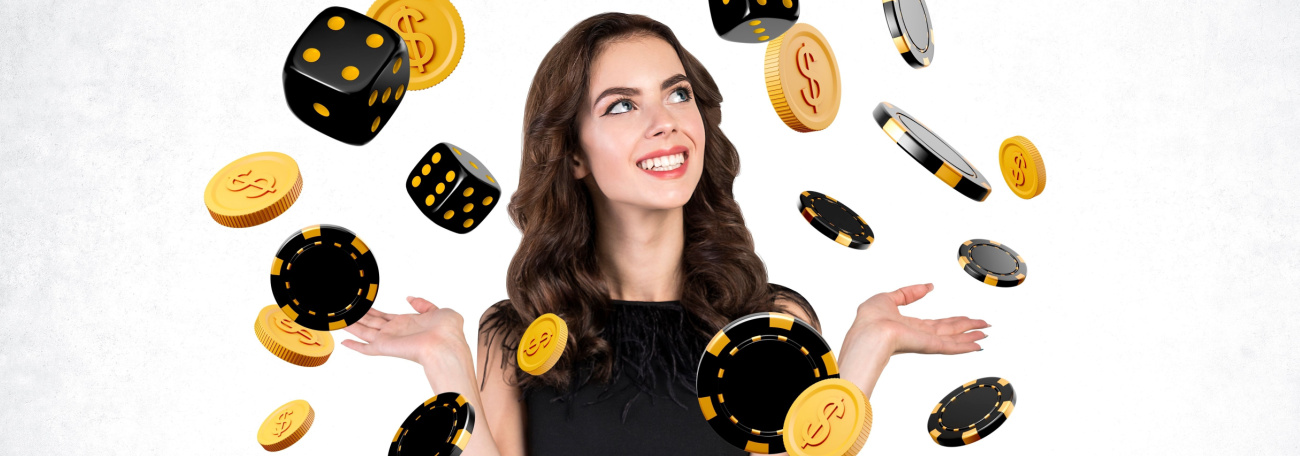 happy young women juggling casino chips and dice