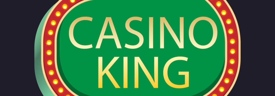 image of the words Casino King as if it's a sign with lights all around the edge