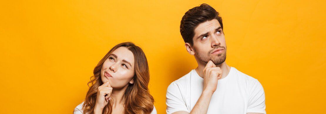 young couple deep in thought about what to play in 2021