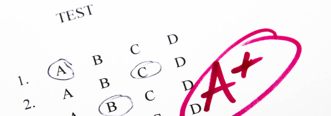 test answers circled A, B, C, D with a red A+ grade for the test