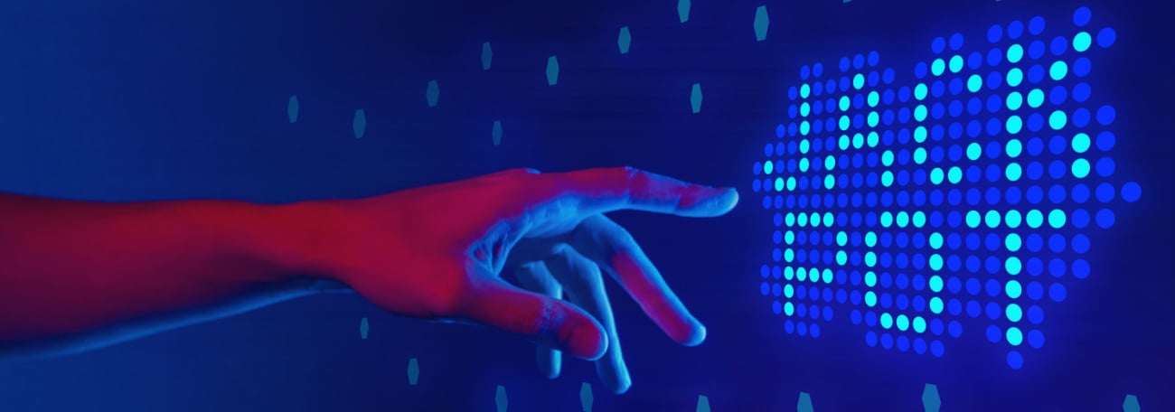 a hand with fingers pointing at the words jackpot in a kind of red neon against a blue background