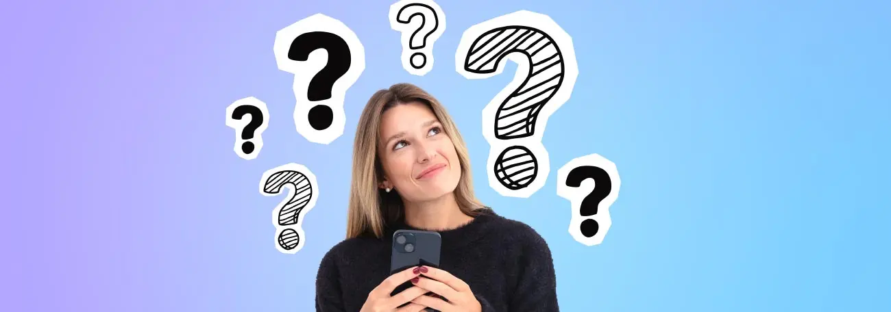 an attractive woman with a simple smile holding a smartphone and looking up at a number of question marks