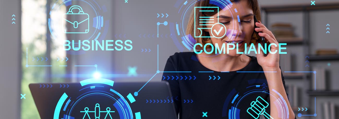 a businesswoman on the phone with holographic images in front of her with the terms business compliance regulation and law